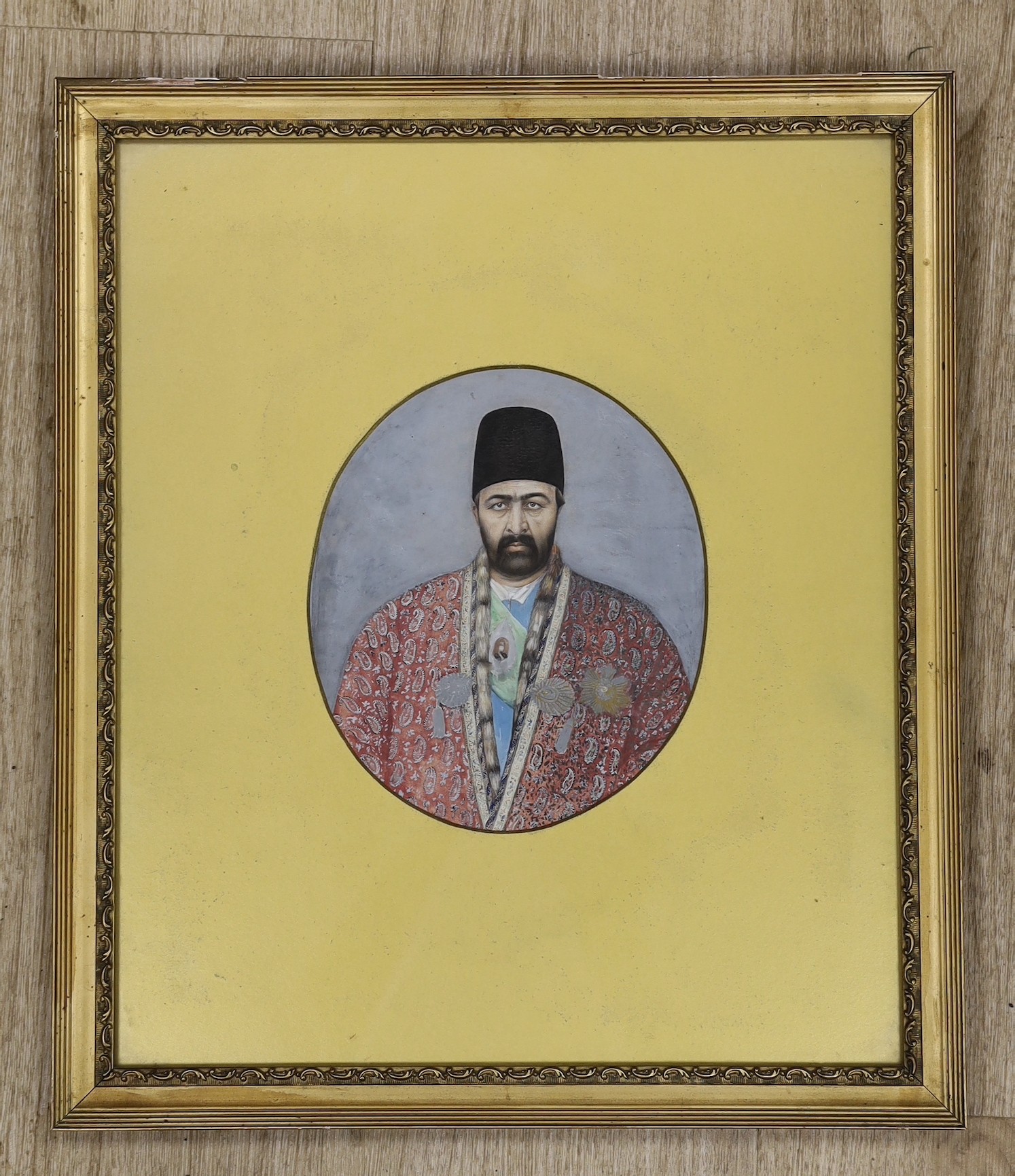 Persian School c.1900, gouache and watercolour on paper, Portrait of a nobleman, 19 x 16cm